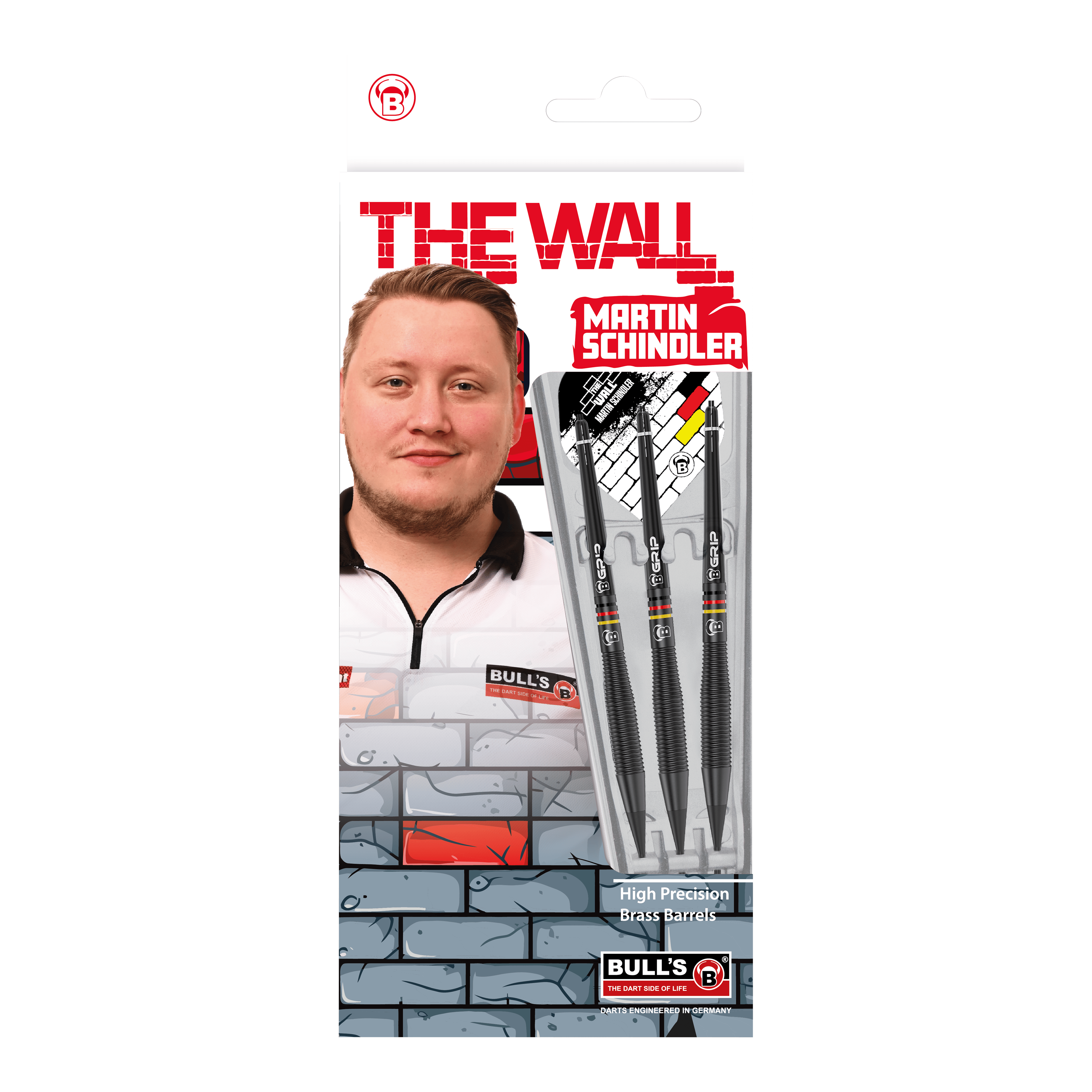 Bulls Martin Schindler The Wall freccette morbide in ottone nero - 18 g Das Bild zeigt die Verpackung der "Bulls Martin Schindler The Wall Black Brass Softdarts - 18g". Auf der Verpackung ist ein Foto von Martin Schindler sowie drei schwarze Softdarts zu sehen.