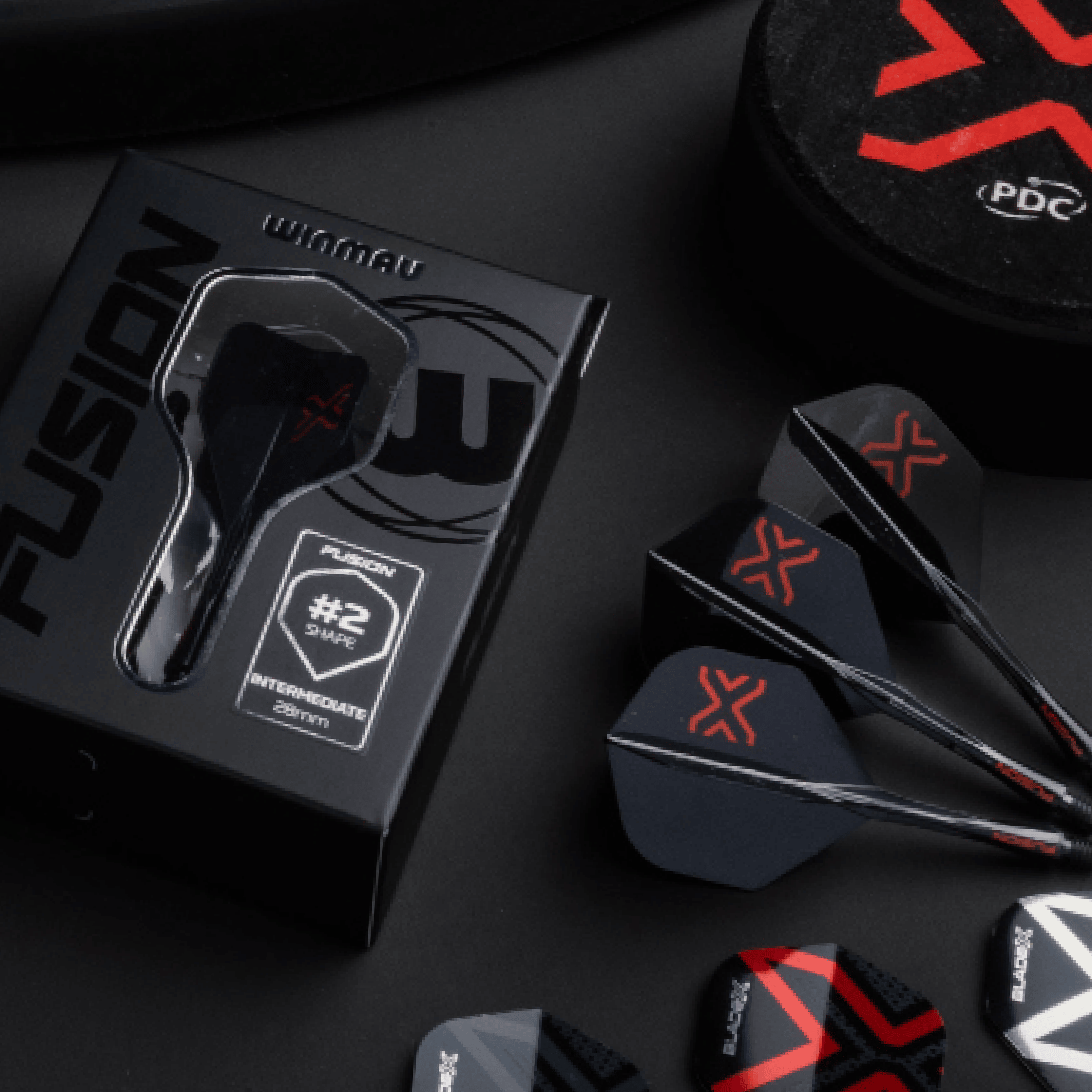 Sistema di alberi di volo standard Winmau Fusion Blade X No2 - Nero Hier sieht man das Winmau Fusion Blade X No2 Standard Flight-Shaft-System in Schwarz. Dieses Produkt kombiniert Flight und Schaft für optimale Performance.