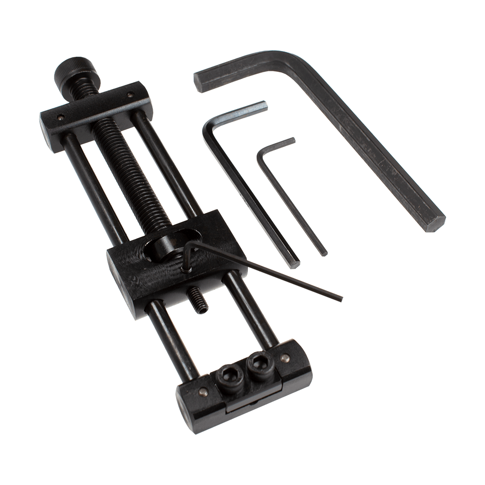 Designa Dart Repointer Black Pro Edition - Cambia punta Dieses Bild zeigt den Designa Dart Repointer Black Pro Edition - Spitzenwechsler. Es handelt sich um ein Werkzeug zum Austausch von Dartspitzen in schwarzem Design.