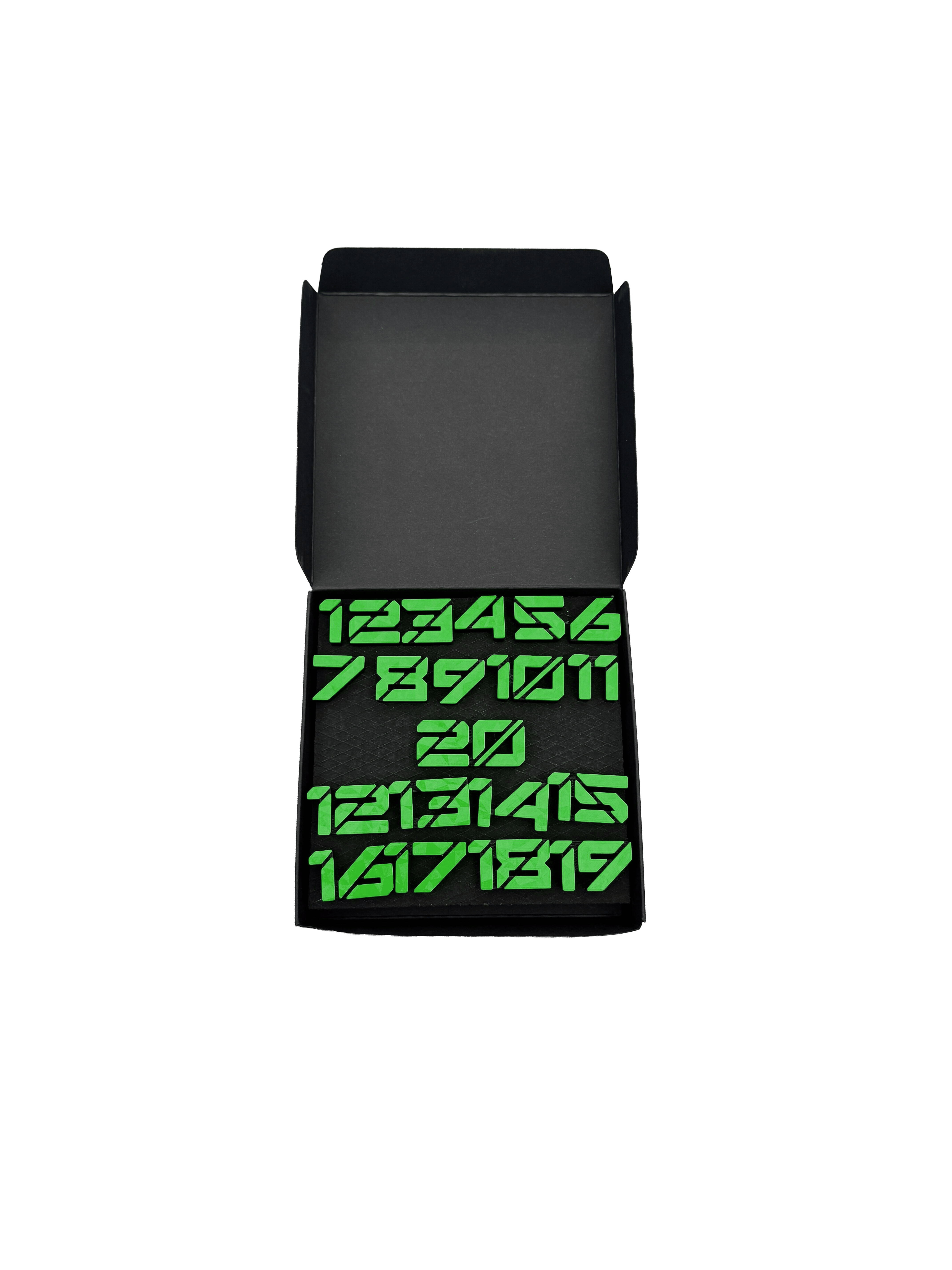 Anelli numerici per freccette McDart / Anello numerico Cyber Das Bild zeigt ein Objekt mit dem Dateinamen 'Cyber Grn Box'. Das Objekt ist eine grüne Box.
