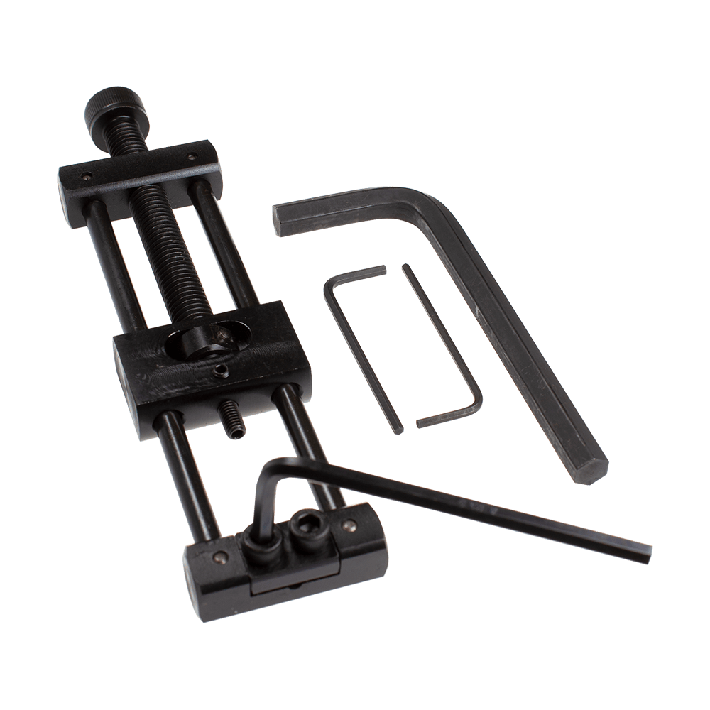 Designa Dart Repointer Black Pro Edition - Cambia punta Das Bild zeigt den Designa Dart Repointer Black Pro Edition - Spitzenwechsler. Es handelt sich um ein Werkzeug für Dartspieler zum Wechseln der Spitzen.
