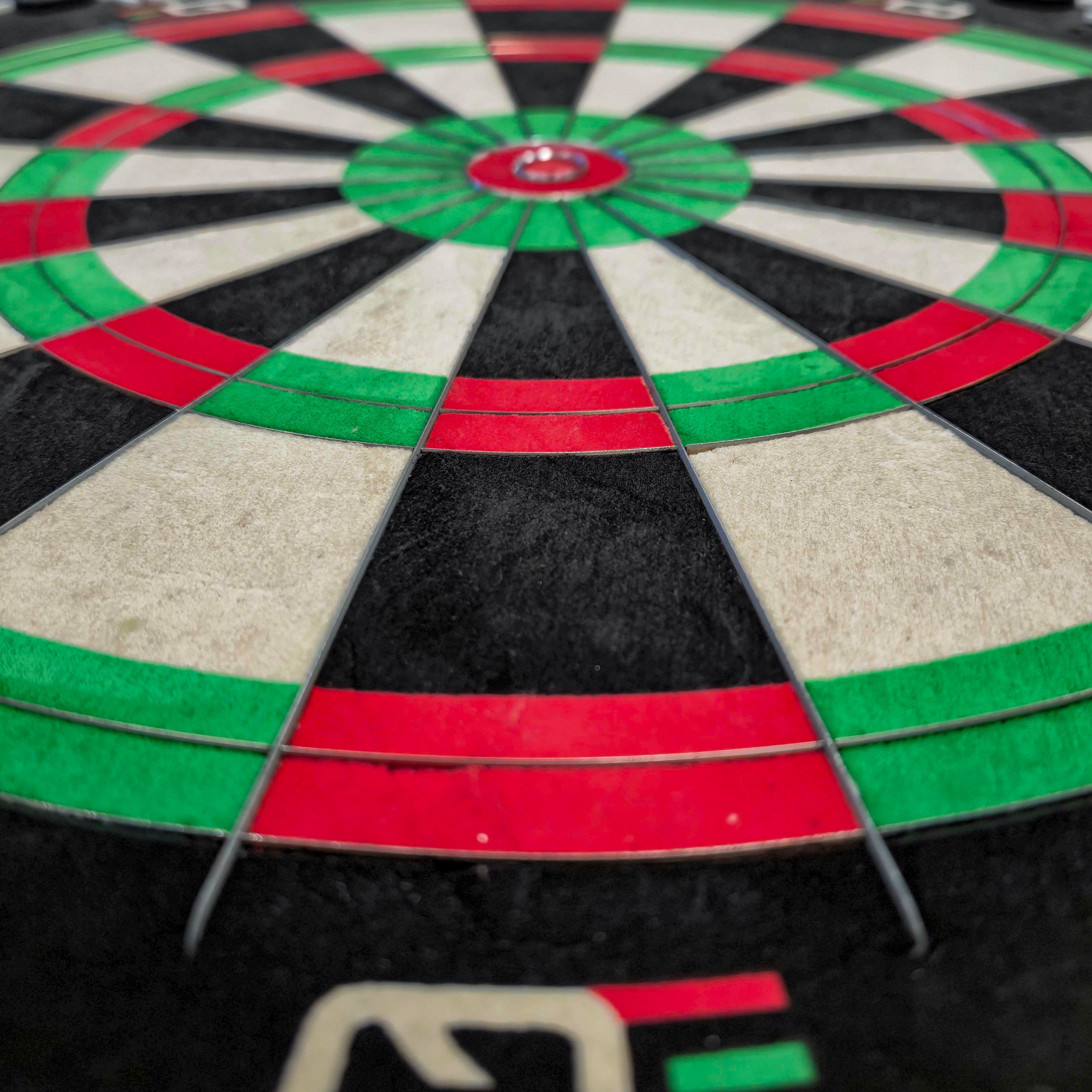 Bersaglio per freccette in acciaio equalizzatore Winmau Das Bild zeigt das Winmau Equalizer Steeldartboard. Es handelt sich um ein Dartboard für Steeldarts.