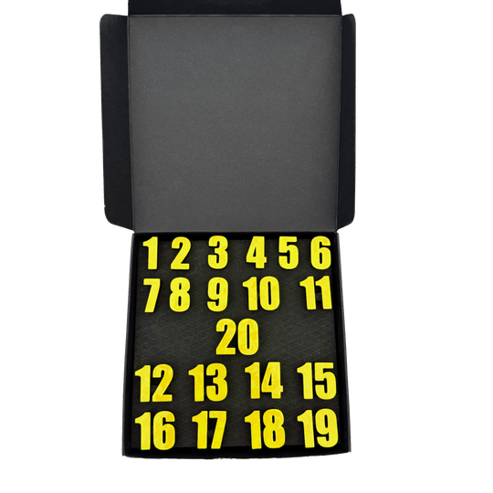 Anelli numerati per freccette McDart / Anello numerato classico Es ist eine Classic-Box in Gelb dargestellt. Die Box besitzt ein klassisches Aussehen.