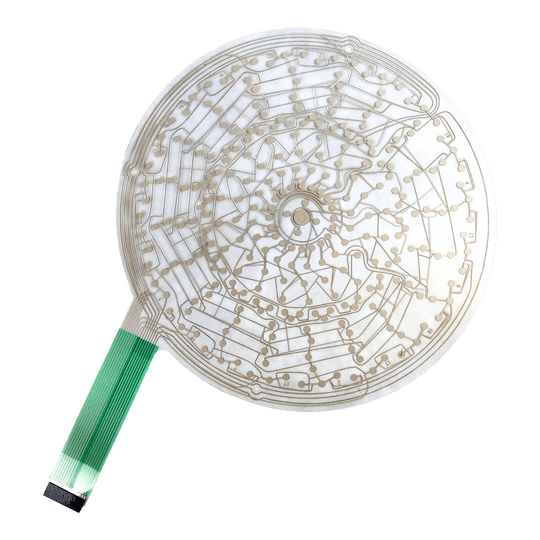 Pezzo di ricambio Karella E-Master Auf dem Bild ist eine runde, transparente Leiterplatte mit feinen Leiterbahnen zu sehen. An der linken Seite befindet sich ein grünes Flachbandkabel zum Anschluss.