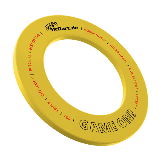 Das Bild zeigt das Produkt MSF-B4_McDart_Game_On_Dartboard_Surround_Gelb_1. Es handelt sich vermutlich um einen gelben Dartboard Surround mit der Aufschrift 'Game On'.