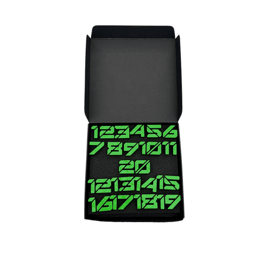 Anelli numerici per freccette McDart / Anello numerico Cyber Das Bild zeigt ein Objekt mit dem Dateinamen 'Cyber Grn Box'. Das Objekt ist eine grüne Box.